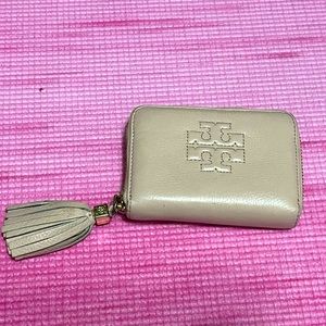 Tory Burch Wallet in pink. It matches the Tory Burch bag that I selling too